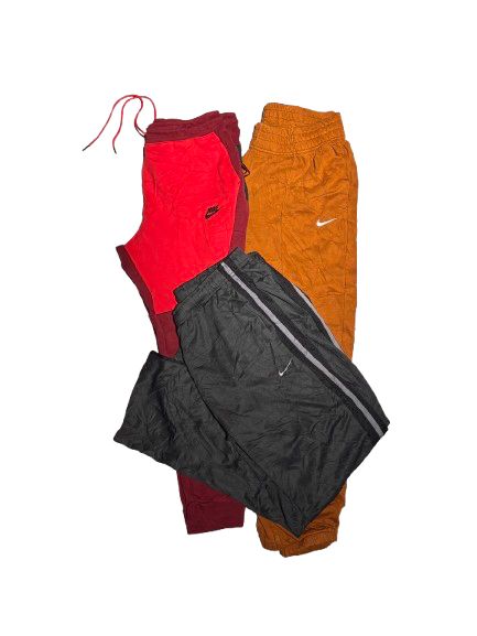 Collection of NIKE JOGGING BOTTOMS/TRACK PANTS in a gallery layout