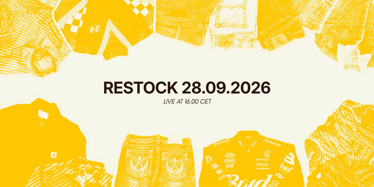 Promotional graphic with yellow illustrated racing jackets and shirts arranged around central black text reading 'RESTOCK 28.09.2026, LIVE AT 16.00 CET'