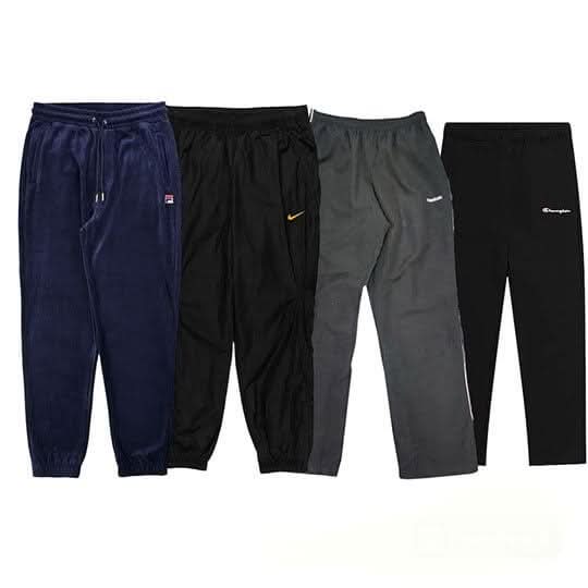 Collection of BRANDED TRACK PANTS in a gallery layout