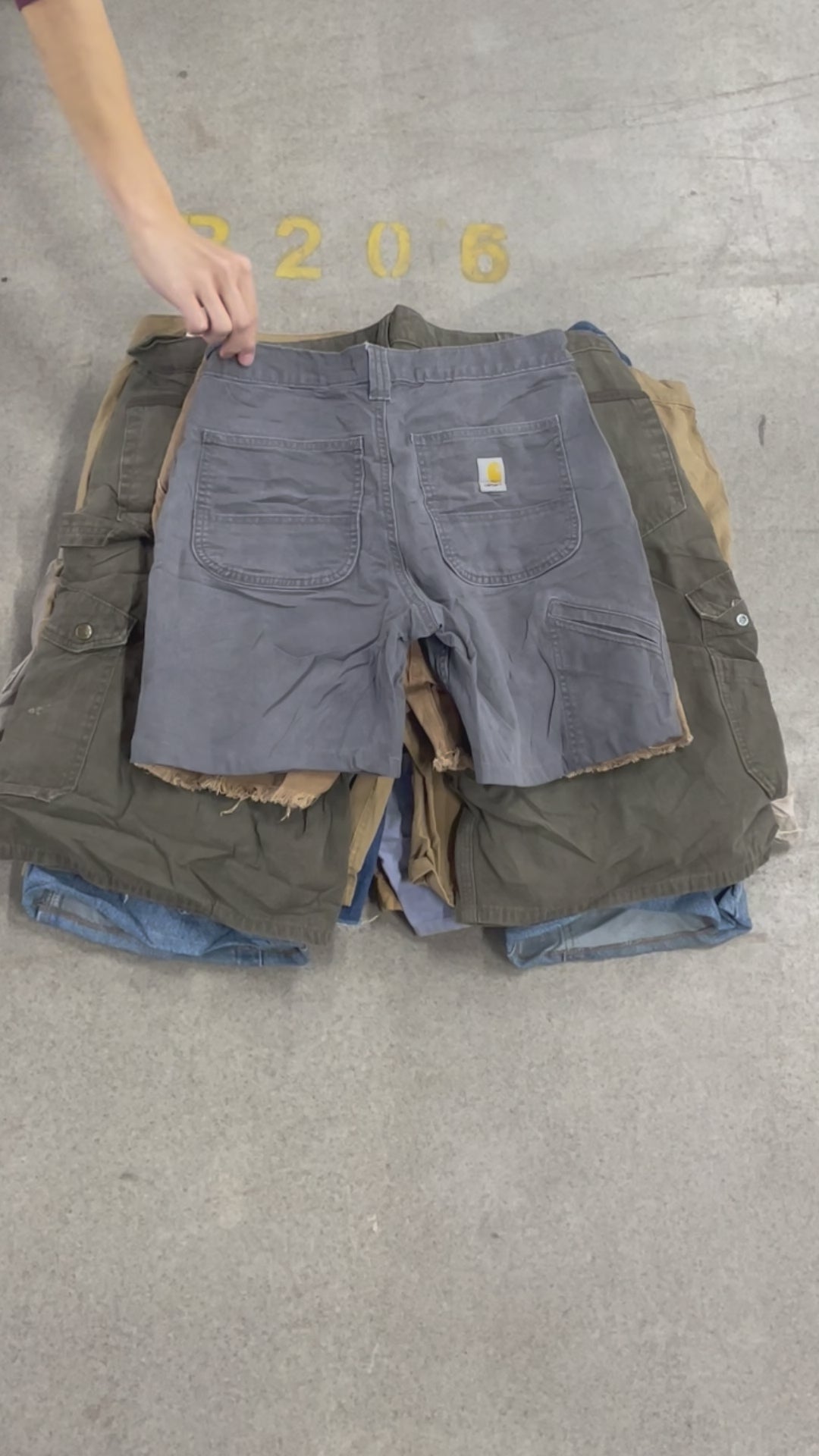 Collection of 50X CARHARTT SHORTS GRADE B in a gallery layout