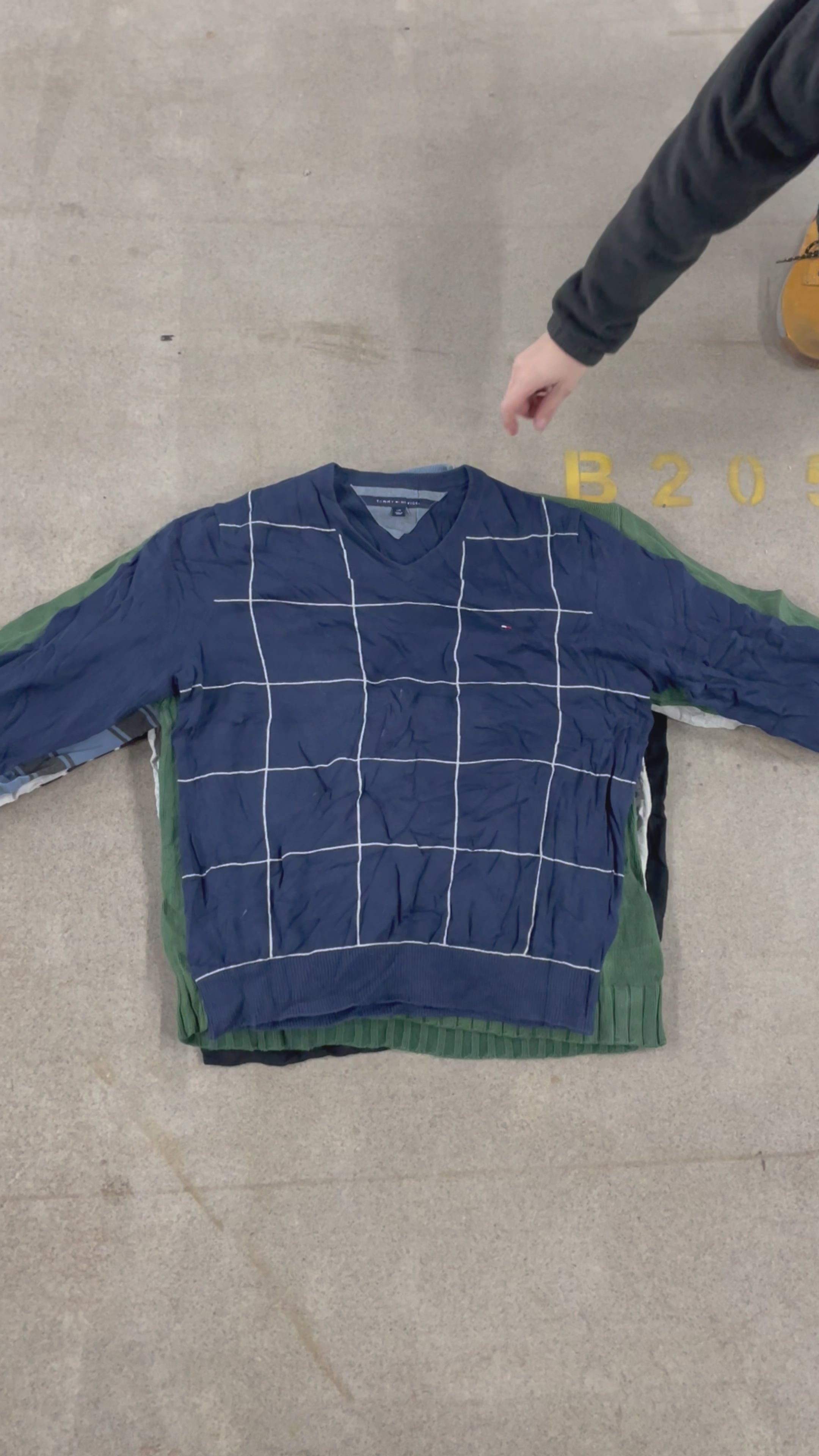 Collection of 25X TOMMY V-NECK SWEATERS in a gallery layout
