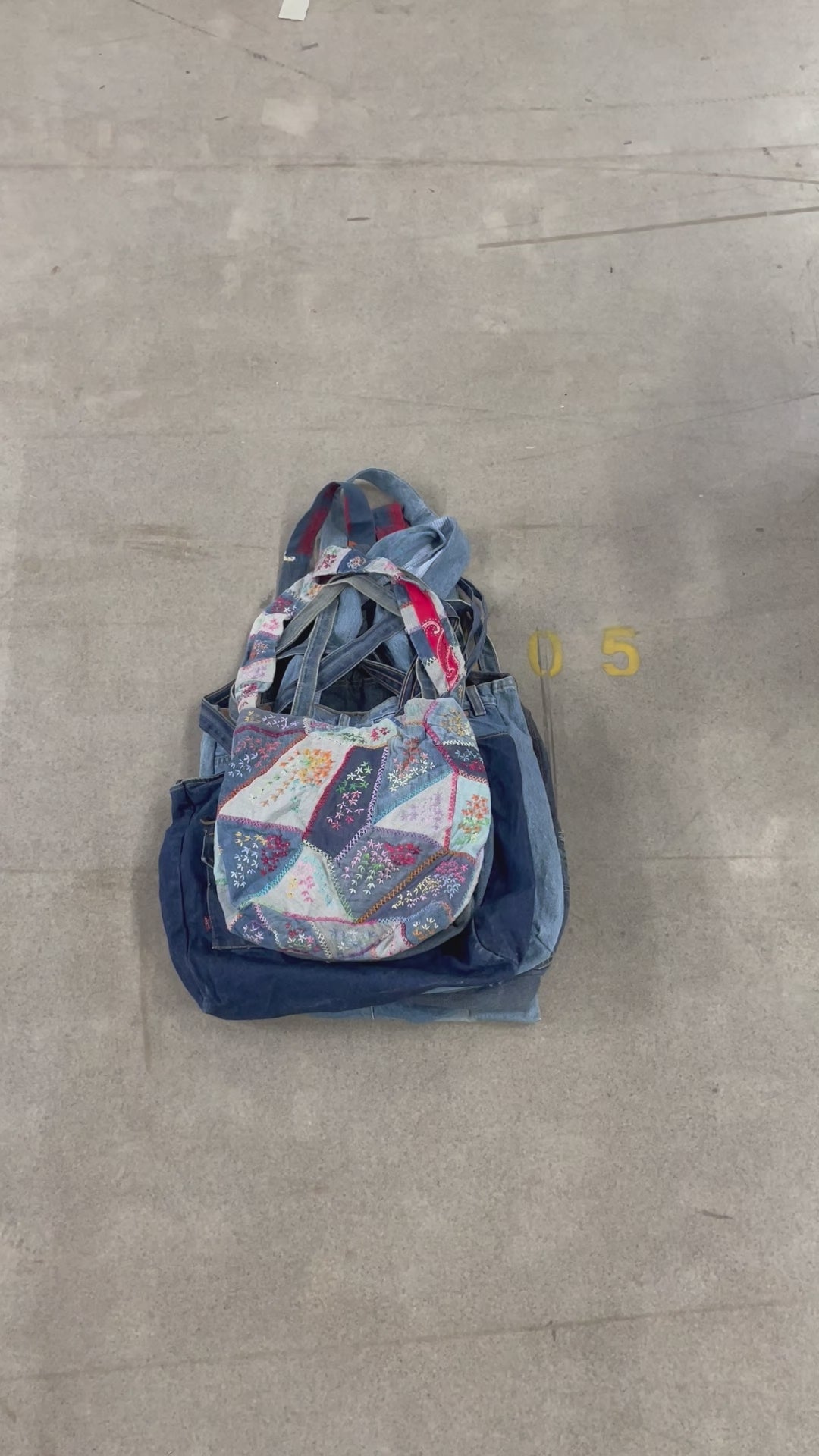 Collection of 25X DENIM REWORKED BAGS in a gallery layout