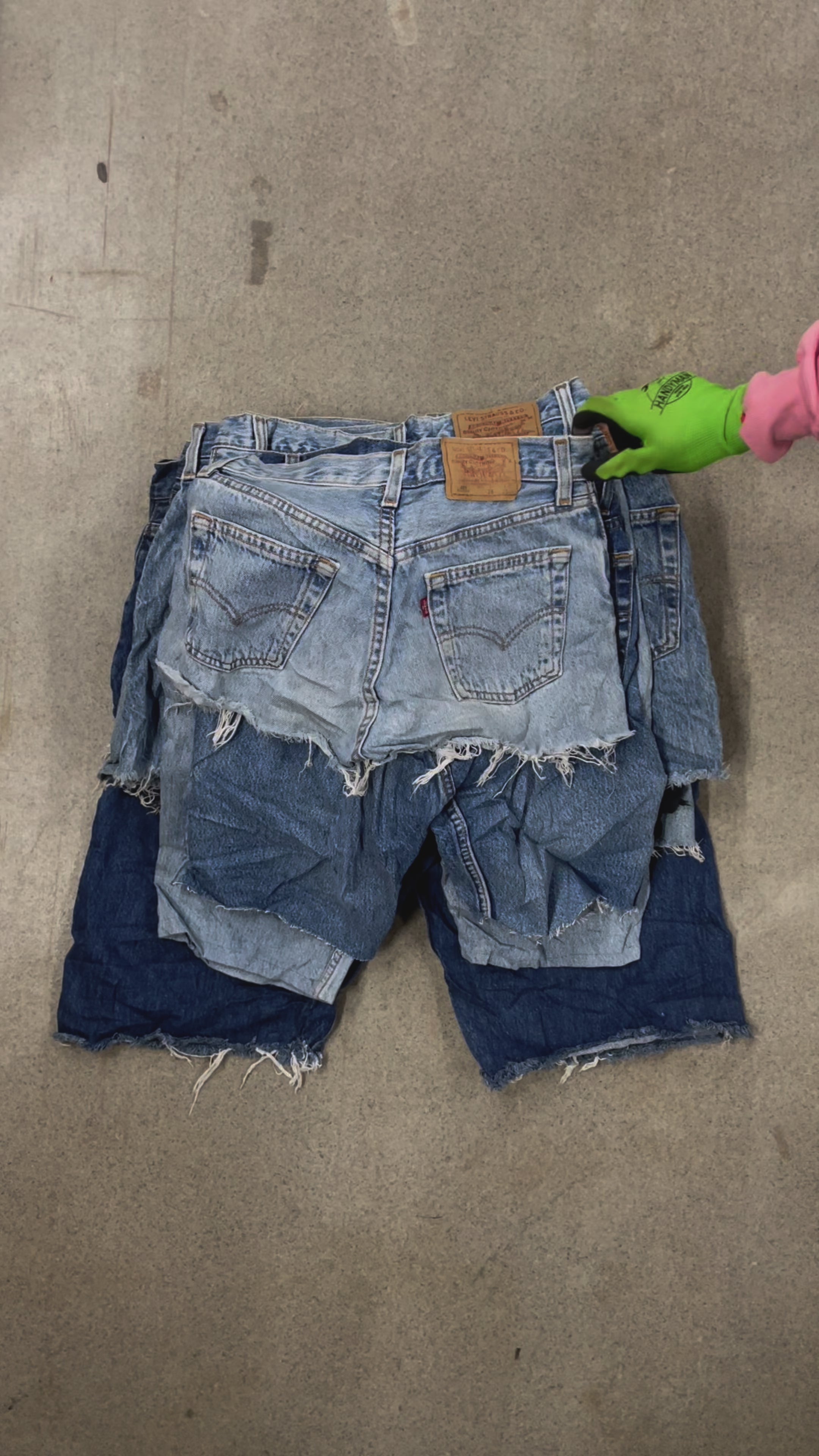 Collection of 50X LEVI'S 501 SHORTS GRADE B/C in a gallery layout